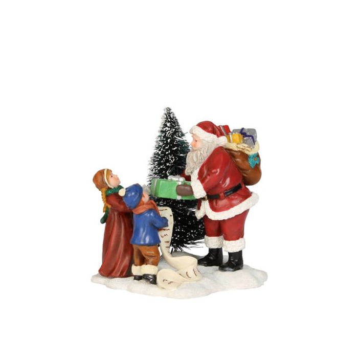 Julemanden deler gaver ud til to søde børn, en pige og en dreng. Drengen står med en lang ønskeseddel. I baggrunden ses et snedækket juletræ. Skøn figur fra Luville.