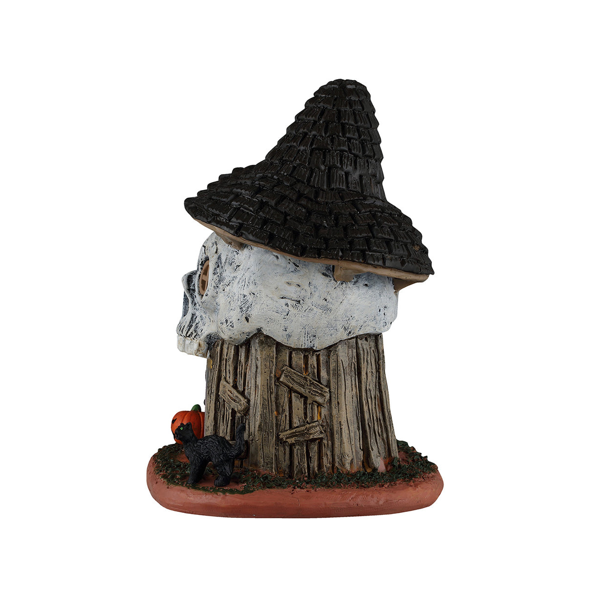 Witch's Skull Hut bygning med lys til Halloween dekoration fra Lemax set fra bagsiden af