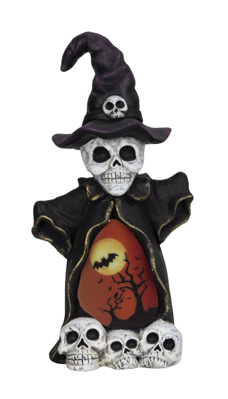 Skjelettfigur med klær og lys i magen til Halloween