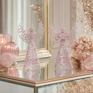 Engel 30 cm høy i lyserosa