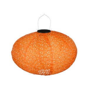 Lanterne med solceller i varmt orange mønster. 