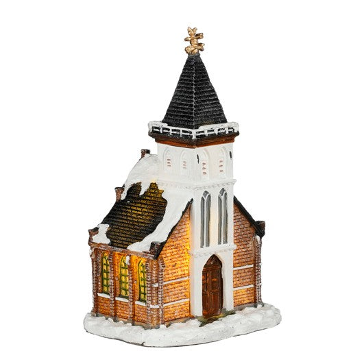 LuVille kirke med højt tårn til julelandskab
