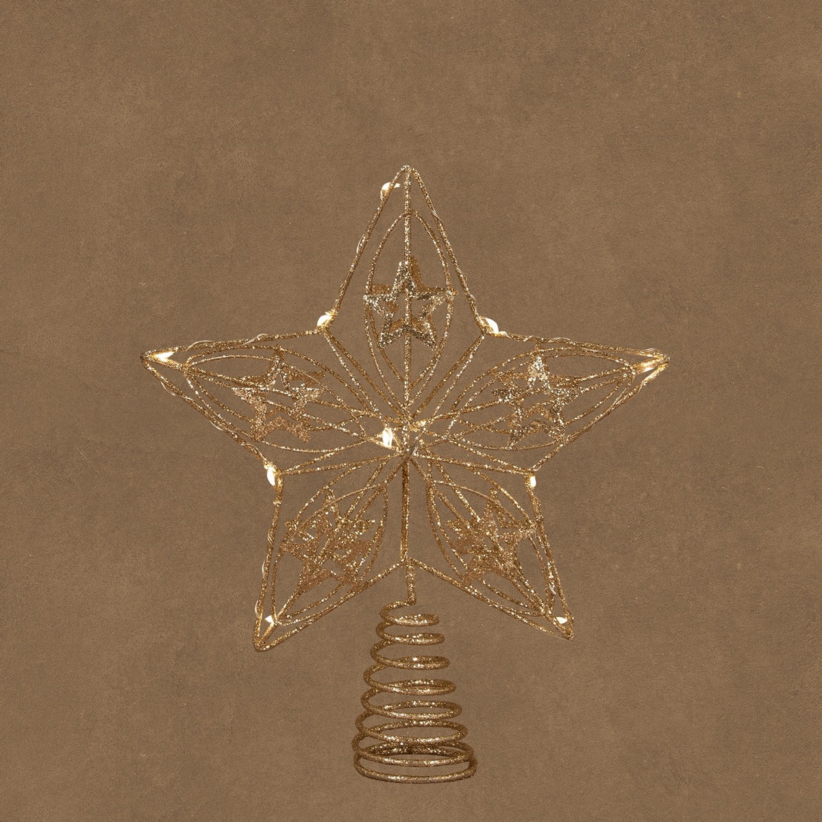 Toppstjerne med lys i champagnefarget metall 25 cm høy fra Luca Lighting