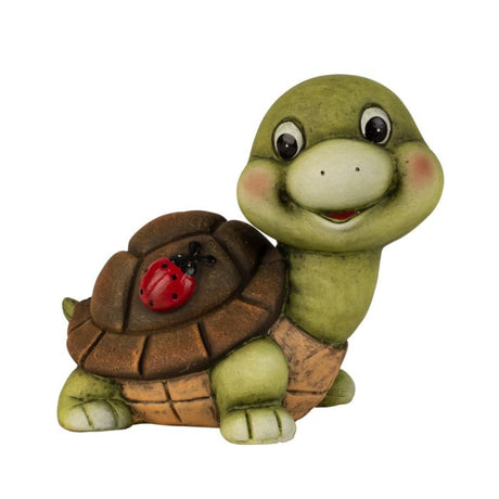 Smilende skildpadde med lille mariehøne på siden af skjoldet. 16 cm høj.