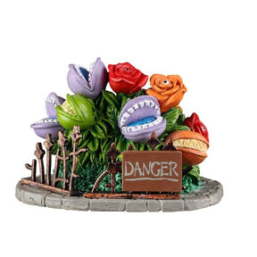 Fearsome Flowers dekorationssæt med kødædende planter og "DANGER" skilt