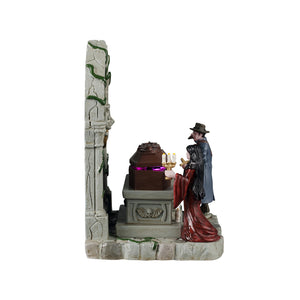 Lighted Coffin figur til Halloween pynt fra Lemax Spooky Town set fra siden med kisten åben