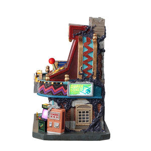 Monstarcadehus med lys til Halloween by fra Lemax Spooky Town set fra siden med billetautomat