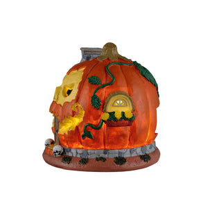 Pumpkin Skull House med lys i til Halloween dekoration fra Lemax set fra siden med vindue