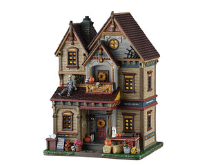 Halloween At The Wilsons hus med lys i porcelæn til Halloween