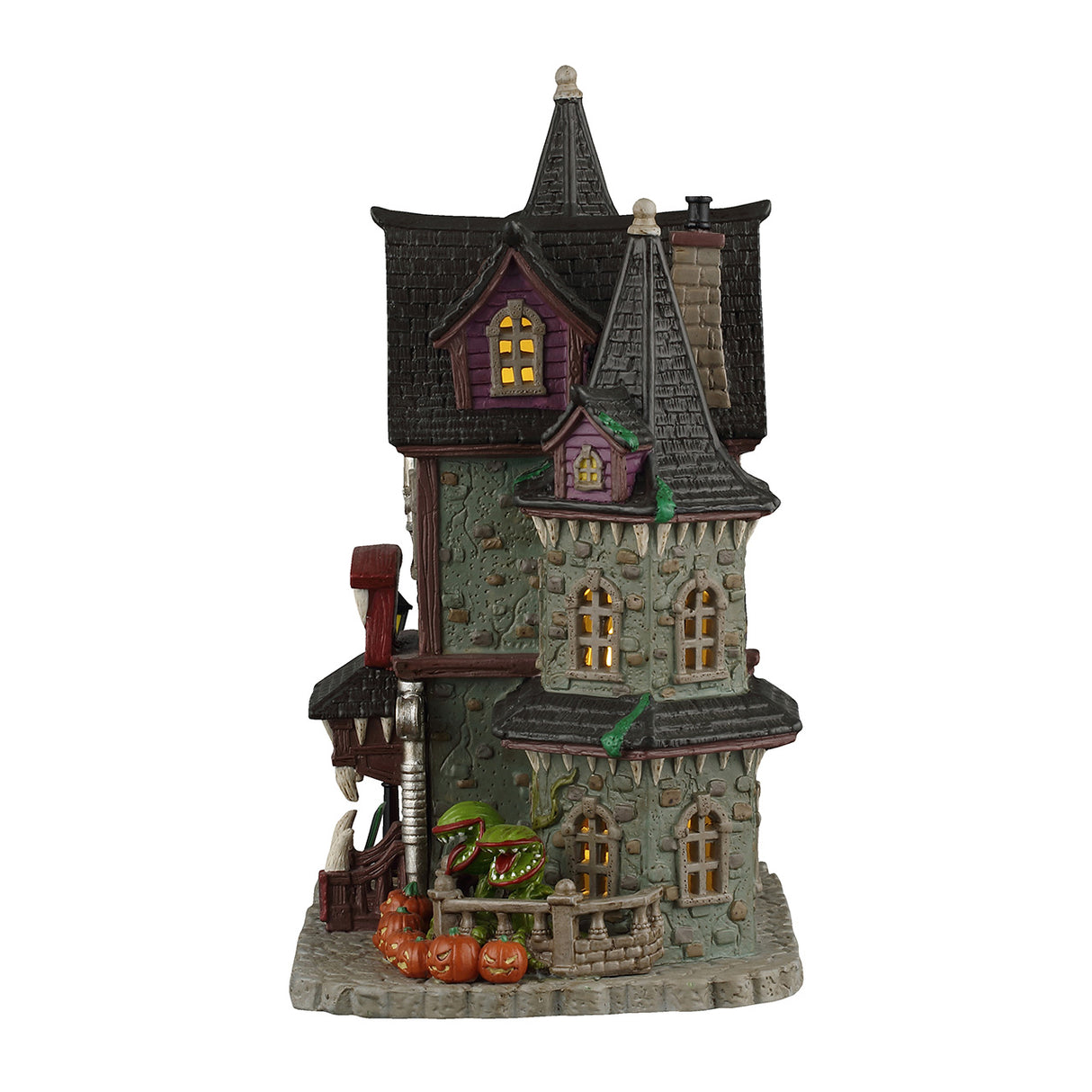 Frightful Fangs Dentistry hus i porcelæn med lys til Halloween dekoration set fra siden med kødædende planter