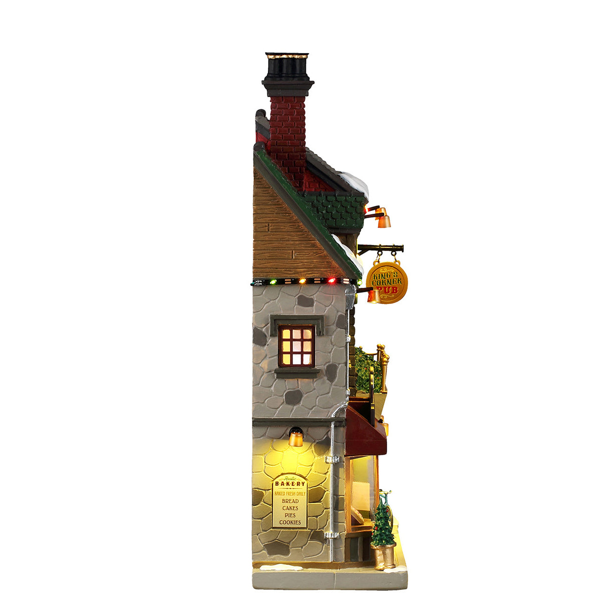 King´s Corner Pub med lys til juleby fra Lemax set fra siden af
