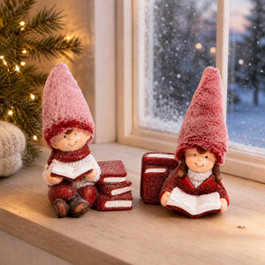 Vinterbarn leser i snøen