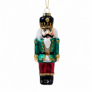 Julekule med nøtteknekker og glitter